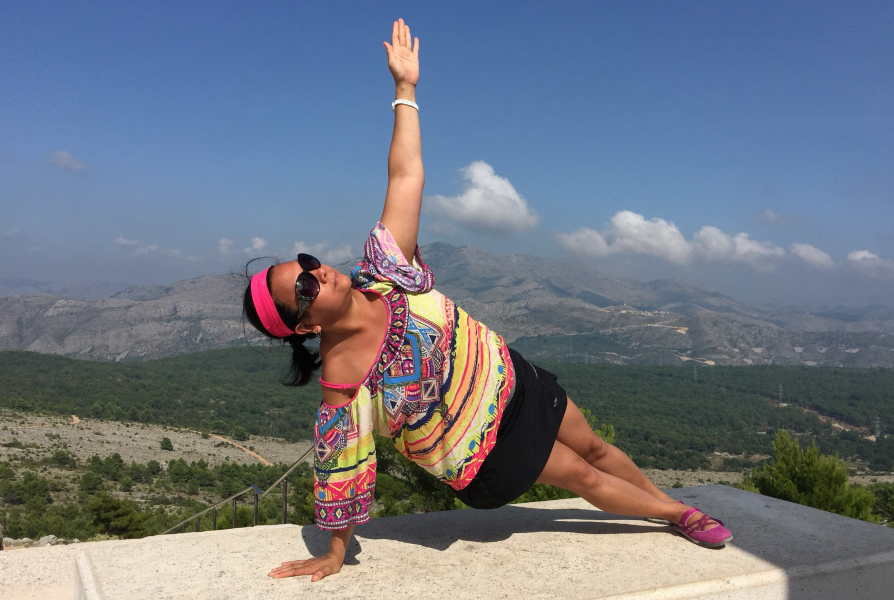 Josephine demonstrating a side plank in Croatia